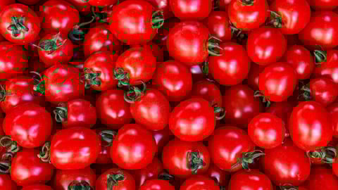 A pile of cherry tomatoes