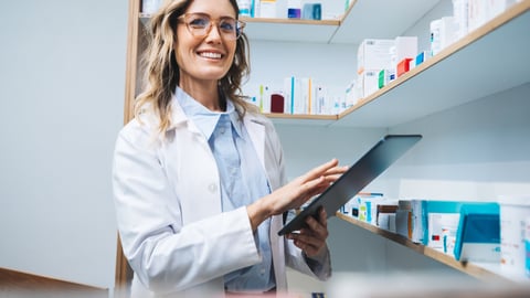 Young woman pharmacist smiling
