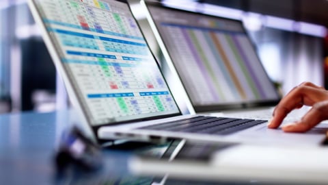 A doctor looking over someone's electronic medical record