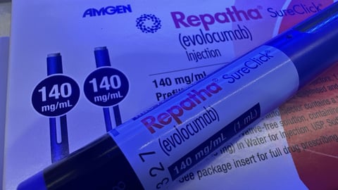 A blue-lit package of evolocumab