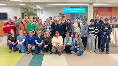 A group of healthcare workers posing for a photo