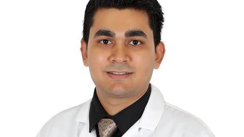 Ankit Kansara in his pharmacist uniform