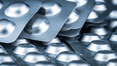 A pile of silver blister packs