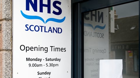 NHS clinic opening times in hours and days at patient entrance