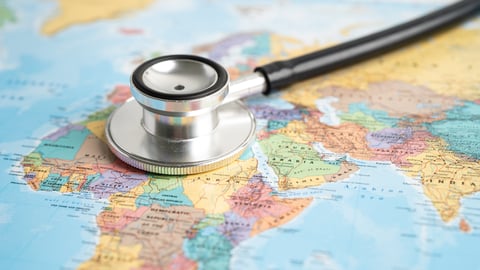 A stethoscope on a globe.