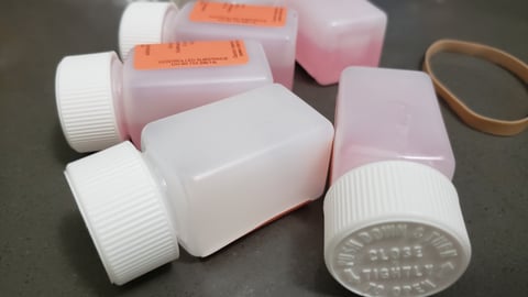 A pile of methadone bottles