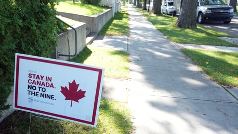 A lawn sign in Alberta ahead of the province's referendum, urging voters to stay in Canada and vote "no to the nine."