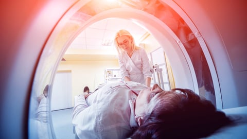 Doctor and patient in the room of computed tomography at hospital. Medical equipment.; Shutterstock ID 1095338627