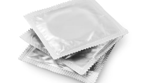 Condoms isolated on white background; Shutterstock ID 142247731