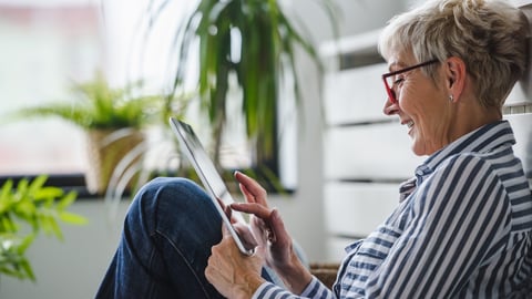 Senior woman using digital tablet at home. The use of technology by the elderly.; Shutterstock ID 1492696199
