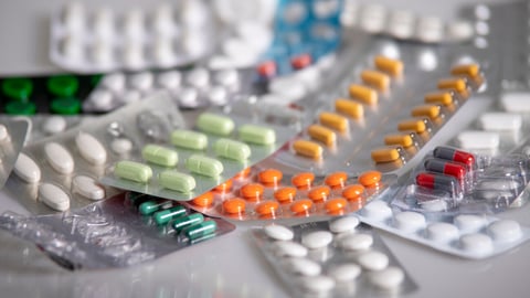 Pills on the table, medicine, colourful pills; Shutterstock ID 1677463138