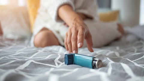 Asmathic girl catching inhaler having an asthma attack. Young woman having asthma attack. She is holding inhaler. Asthmatic woman using an asthma inhaler during asthma attacks ; Shutterstock ID 1782286208