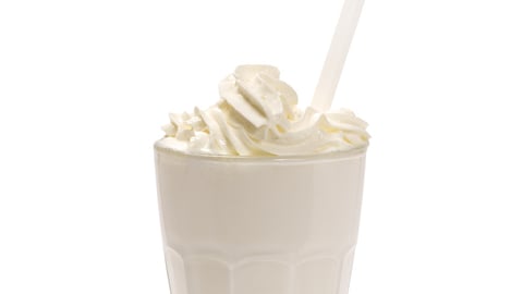 milkshake in a tall glass; Shutterstock ID 209393299