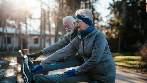 An older married couple enjoys exercising and jogging on a beautiful sunny winter day.; Shutterstock ID 2115110792