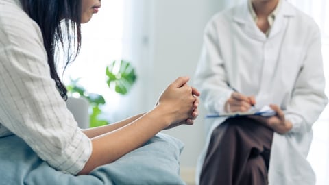 Asian psychology doctor examine and listen to woman patient at home. Attractive beautiful female physician give advise and consult to help young girl solve problem for Psychologic health care in house; Shutterstock ID 2132376093