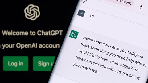 ChatGPT chat bot screen seen on smartphone and laptop display with Chat GPT login screen on the background. A new AI chatbot by OpenAI. Stafford, United Kingdom, December 13, 2022.; Shutterstock ID 2237752713