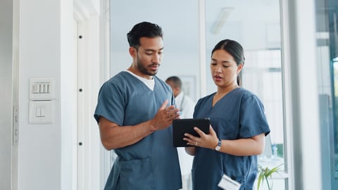 Medical advice, help and doctors with a tablet for healthcare, research and medicine planning. Communication, collaboration and men working in cardiology talking about surgery results on technology; Shutterstock ID 2265615071