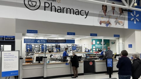 Walmart retail store Pharmacy serves waiting customers, Peabody Massachusetts USA, April 19 2023; Shutterstock ID 2291752415