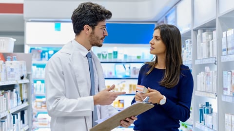 Pharmacy, medicine and pharmacist talking to customer while working in a retail store. Professional man in pharmaceutical or medical industry for service, healthcare and advice for a woman client; Shutterstock ID 2315198817