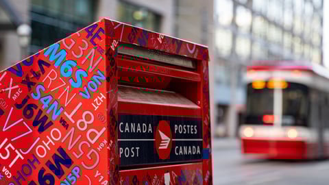 Canada Post box in Downtown Toronto. Canada Post Corporation is a Crown corporation that functions as the primary postal operator in Canada. Toronto, Canada - April 29, 2024.; Shutterstock ID 2456963039
