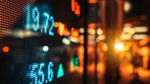 Vibrant Stock Exchange Index Board in Nighttime City; Shutterstock ID 2460220893