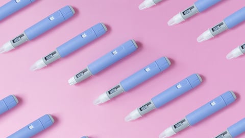 medical drug Ozempic injection lies on a pink background, top view. Medicine and weight loss, concept. injectors dosing pens for subcutaneous injection of antidiabetic medication or anti-obesity; Shutterstock ID 2500958309