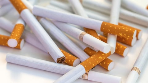 Close up stack of cigarettes on white background. cigarettes isolated on white; Shutterstock ID 2512615585
