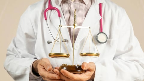 Close-up doctor holding a scale in his hands, medical lawyer, claim for injuries and consequences, medical sentence, medical disability, medical jury, treatment price, health, medicine price; Shutterstock ID 2529104473