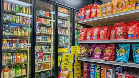 Canada, Quebec, 24 November 2025 : Colorful snack aisle filled with chips, drinks, cans, packages, bottles; Shutterstock ID 2710359665