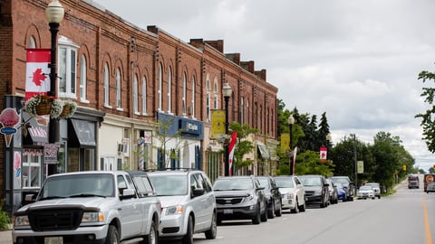 NEW TECUMSETH, CANADA - SEPTEMBER 15, 2017: MAIN STREET WITH PARKED CARS AND BUILDINGS IN SMALL TOWN, ONTARIO. ; Shutterstock ID 738970837