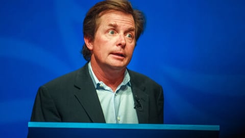 ORLANDO, FLORIDA - JANUARY 16, 2012: Actor Michael J. Fox delivers an address to IBM Lotusphere 2012 conference on January 16, 2012. He tells how social networks help him fight his Parkinson disease.; Shutterstock ID 775792954