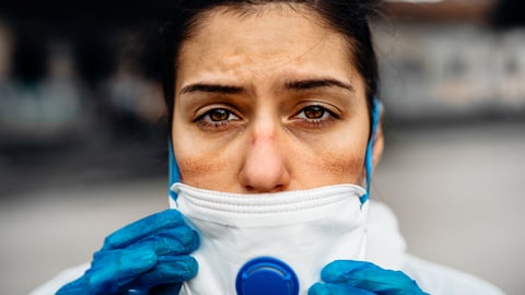 Stressed EastIndian healthare worker shutterstock 