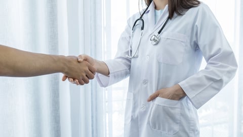 doctor shaking hands