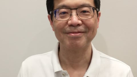 Dr. Adam Chen smiling