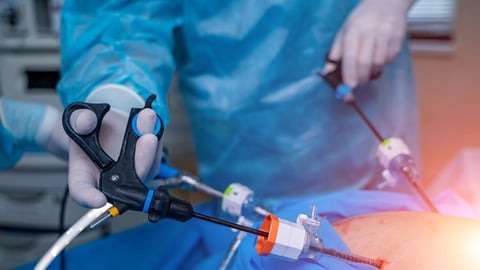 Physician performing surgery