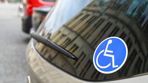 car-windshield-with-blue-sticker-wheelchair