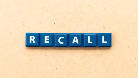 Blue tiles spell RECALL
