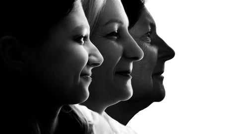 faces of woman of different ages in black-and-white profile