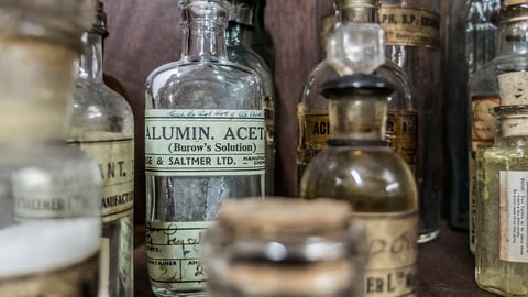 Shelf of antique medicines from a pharmacy