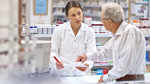 Pharmacist assisting a patient