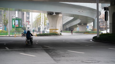 Street nearly empty during first day of the lockdown of the city to prevent coronavirus epidemic in Wuhan, China