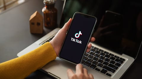 Closed up image of a Female using TikTok application on a smartphone in home.17 November, 2022. ChiangMai, Thailand.; Shutterstock ID 2227479521