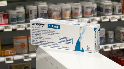 Packaging box of Wegovy (semaglutide) injectable prescription medication, weight-loss drug from Novo Nordisk AS. Pharmacy shop shelves in background. Copenhagen, Denmark - November 13, 2023.; Shutterstock ID 2387848075