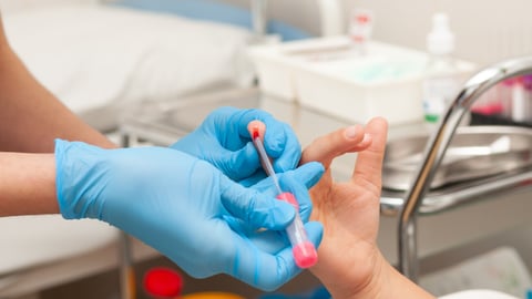 Close-up blood test from a child's finger. Doctor takes blood from a little girl's finger.; Shutterstock ID 2238032867