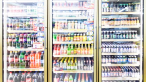 Blur image of beverage cooler in a convenience store.; Shutterstock ID 1084460336