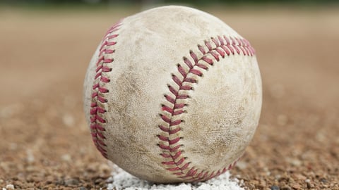 A baseball in on a baseball diamond; Shutterstock ID 78696160