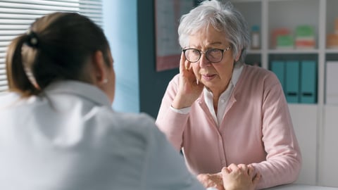 Caring doctor assisting a senior patient in her office, she is comforting her; Shutterstock ID 1931619776