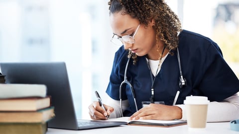 Medical student, thinking or writing books in research education, wellness studying or hospital learning. Laptop, nurse or healthcare woman and notebook, technology or scholarship medicine internship; Shutterstock ID 2260732105