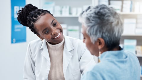 Pharmacy, healthcare or medical with a customer and black woman pharmacist in a dispensary. Medical, insurance and trust with a female medicine professional helping a patient in a drugstore; Shutterstock ID 2269474067