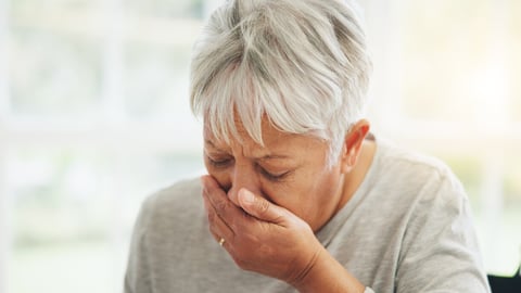 Senior, woman and mouth hand for cough sick or winter virus, bacteria infection or flu disease. Old person, anxiety or fear illness for wellness of asthma risk or tuberculosis, cancer on wheelchair; Shutterstock ID 2389006819